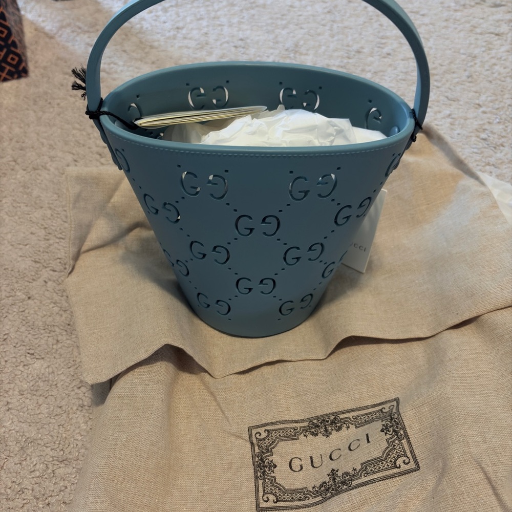 Gucci Supreme GG logo Rubber Bucket Bag in teal color